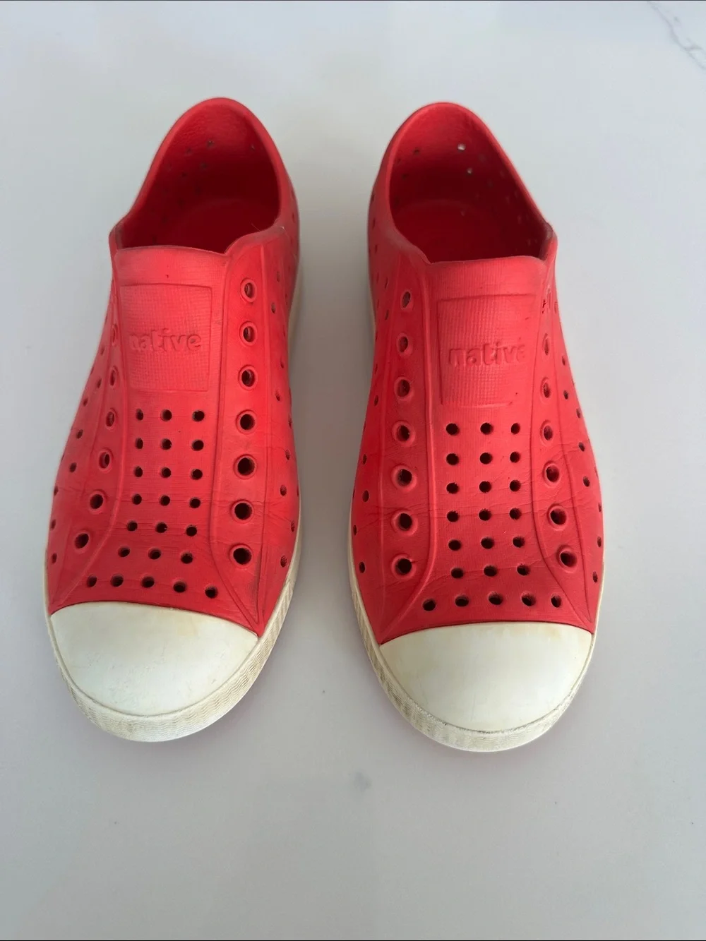 Native Red Slip-On Perforated Sneakers with White Soles